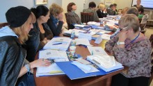 Participants work at the pilot training in Uzhgorod.