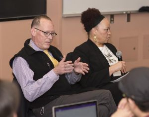 Dr. Paul Farmer and Dr. Rachel Chapman during a discussion with UW students reflecting on equity, race, and global health. 